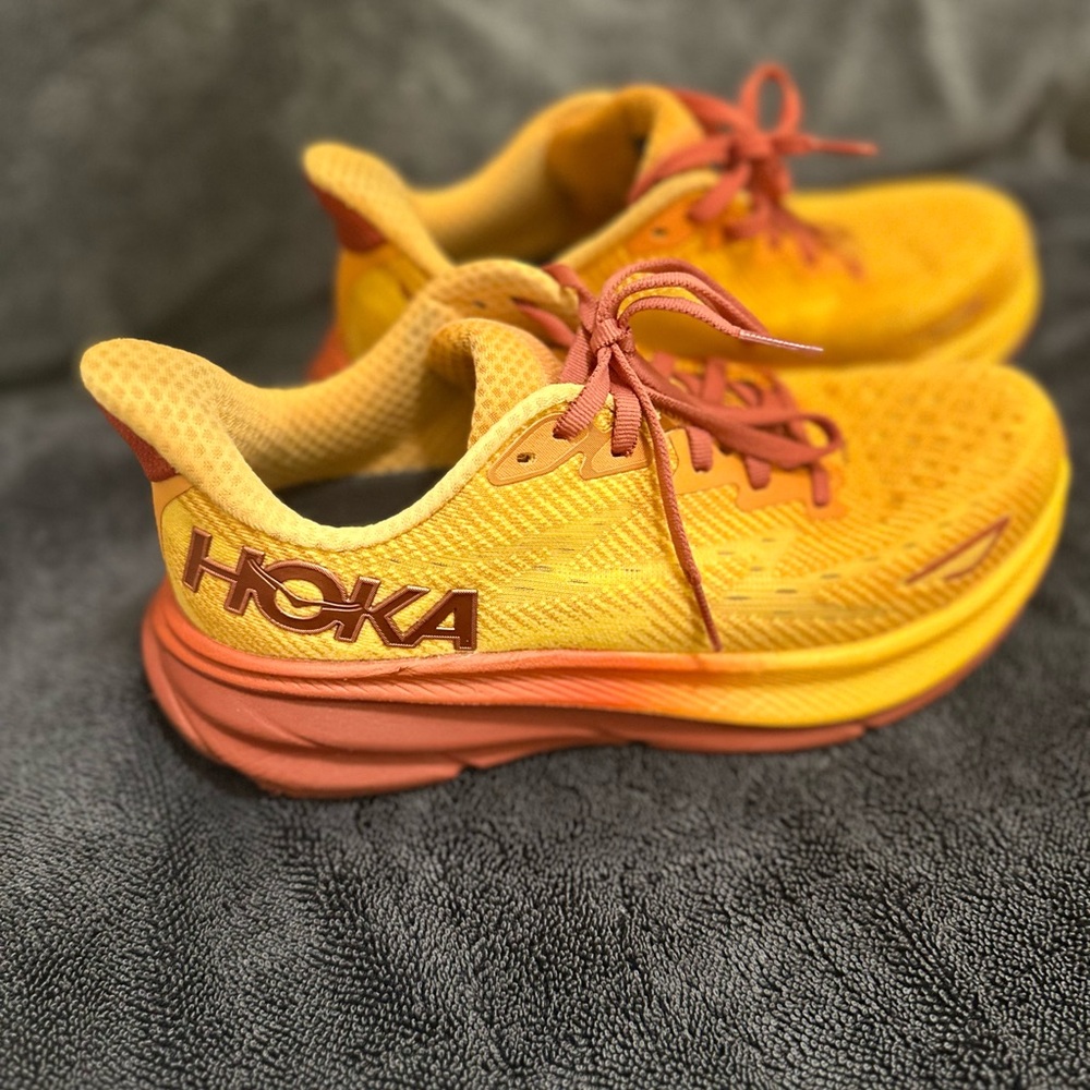 Hoka Vibrant Yellow and Red Athletic Shoes